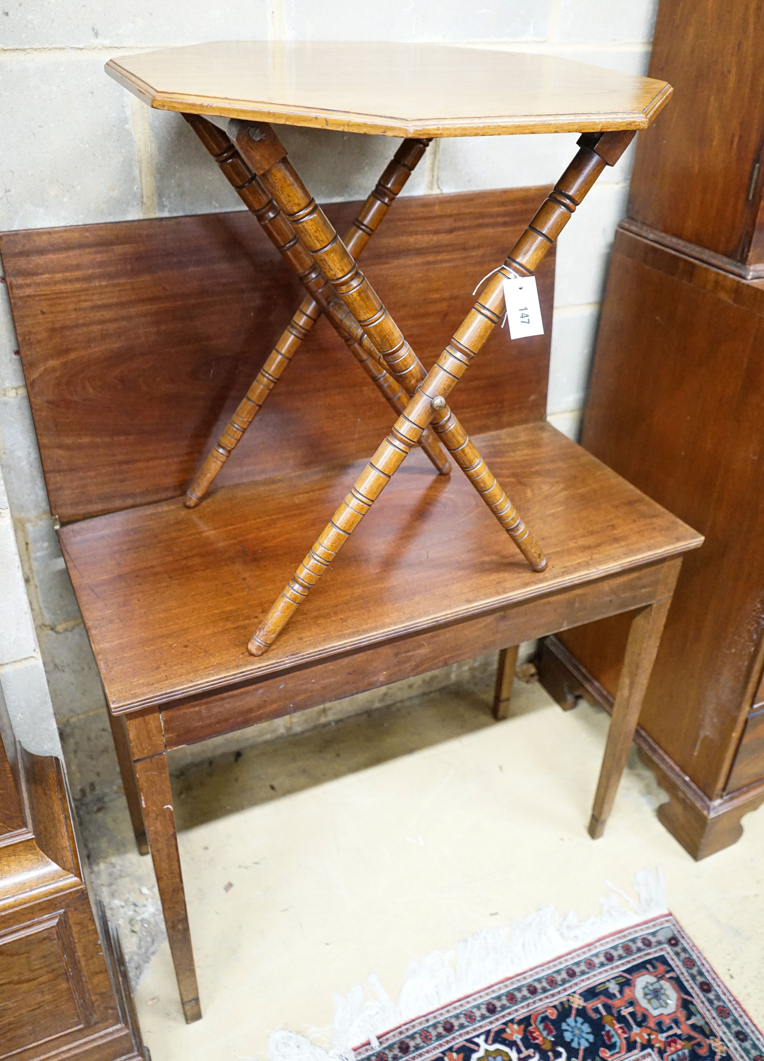 A George III folding tea table and a later walnut octagonal folding table